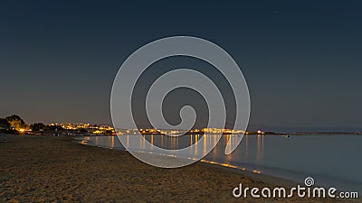 Night view of Golden beach or Xrisi Akti in Paros island in Greece. Stock Photo