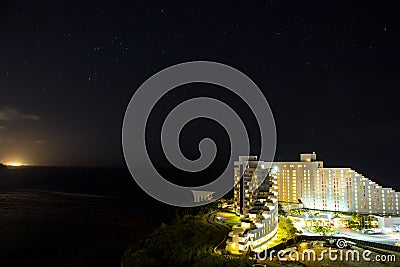 Night view of Hotel Nikko Guam with beautiful Tumon Bay Editorial Stock Photo