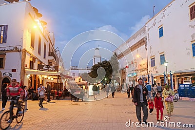 Night view of locals and tourists walking in the ancient old town. Essaouira, Morocco. Editorial Stock Photo