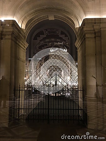 Night view of Louvre pyramid from inside the museum, Paris, France Editorial Stock Photo