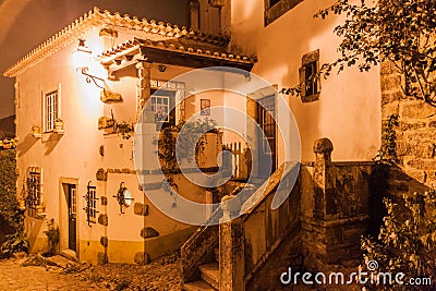 Night view of old houses in Obidos village, Portug Stock Photo