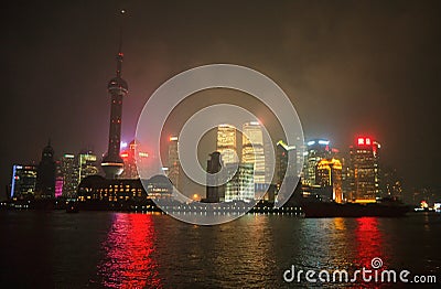 The night view of Oriental Pearl Tower, Shanghai tower, Jin Mao tower, Pudong Shangri-La, and skyscrapers in Pudong Editorial Stock Photo