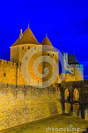 Night view of Porte Narbonnaise leading to the old town of Carcassonne, France Stock Photo