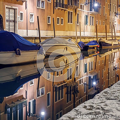 Night view of a reflected facade at the water surface Stock Photo