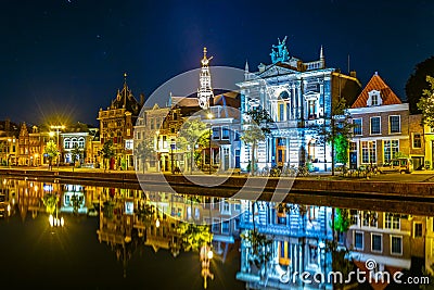 Night view of Teylers museum situated next to a channel in the dutch city Haarlem, Netherlands Stock Photo
