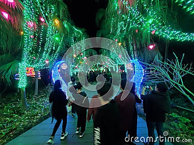 The night view of tourists are visiting the 13th Huizhou West Lake Lantern Festival in Huicheng District, Huizhou City, China Editorial Stock Photo