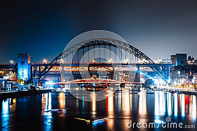 Night view of Tyne Bridge, an arch bridge over River Tyne in North East England, symbol of Tyneside Editorial Stock Photo