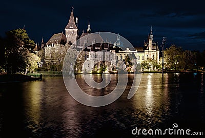 Night view of Vajdahunyad castle from lakeside Stock Photo