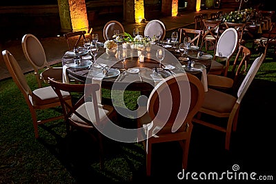 Night wedding with candles and flower table decoration Stock Photo