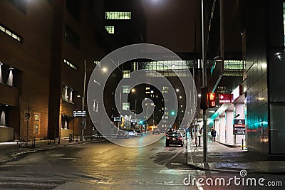 Nightlife in the city center - downtown panorama. Buildings, night lights, traffic, modern architecture Editorial Stock Photo