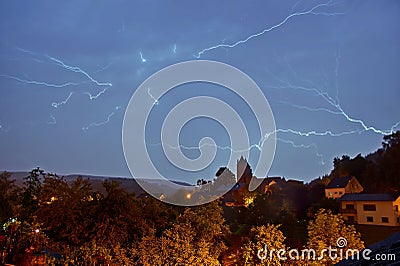Nightly thunderstorm over Bertrada Castle in Germany Stock Photo