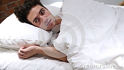 Nightmare, Sleeping Man Awakes by Scary Dream Stock Photo