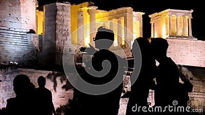 Silhouettes of tourists, visitors and locals at the Acropolis Editorial Stock Photo