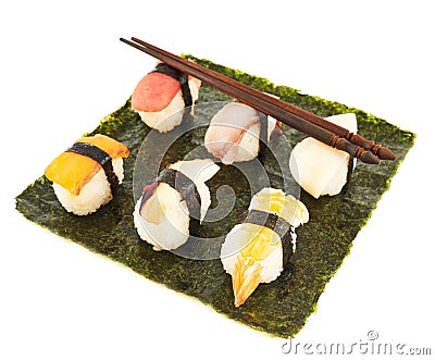 Nigirizushi sushi over nori sheet Stock Photo