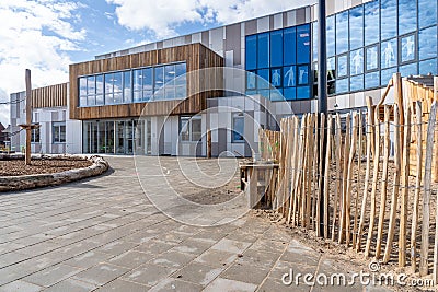 NIJMEGEN / NETHERLANDS-SEPTEMBER 13, 2019: Modern school building for children up to 12 years old. The exterior facades are sleek Stock Photo