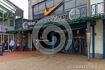 Nike Clearance store front and entrance logo. Editorial Stock Photo