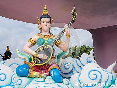 Nikhom Kham Soi, Mukdahan, Thailand - July 31, 2022: Statues of Thai angels in various gestures related to playing a musical Editorial Stock Photo