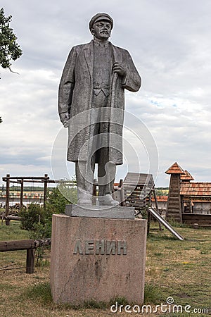 NIKOLAEV, Ukraine - CIRKA 2013: The statue of Vladimir Lenin - Ulyanov in a private private museum of abandoned Soviet-era monumen Editorial Stock Photo