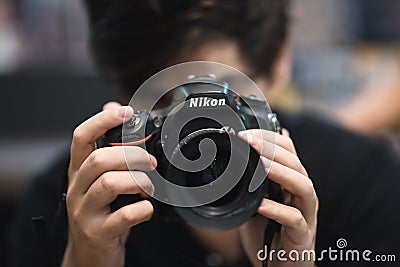 Nikon DSLR Photographer Editorial Stock Photo