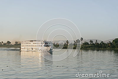 Nile River Encounter: Contrasting Cruise Ships Egypt Summer Travel Stock Photo