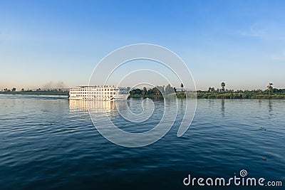 Nile River Encounter: Contrasting Cruise Ships Egypt Summer Travel Stock Photo