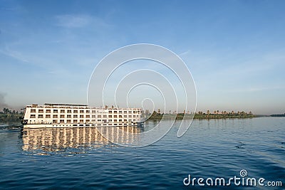 Nile River Encounter: Contrasting Cruise Ships Egypt Summer Travel Stock Photo