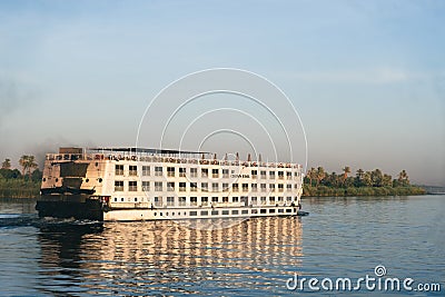 Nile River Encounter: Contrasting Cruise Ships Egypt Summer Travel Editorial Stock Photo