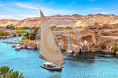 Nile River scenery with famous sailboats, Aswan, Egypt Stock Photo