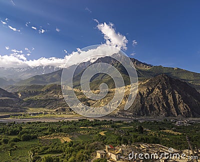Nilgiri and Tilicho Himal view on the way to Jomsom in Mustang Stock Photo