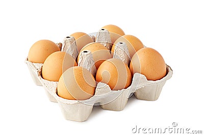 Nine brown fresh eggs in retail tray on white Stock Photo