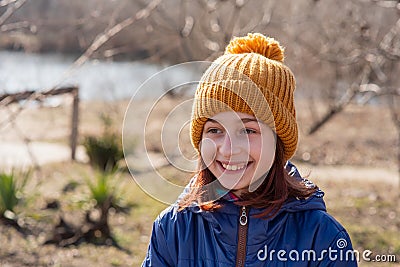 Nine year old girl enjoying winter outdoors Stock Photo