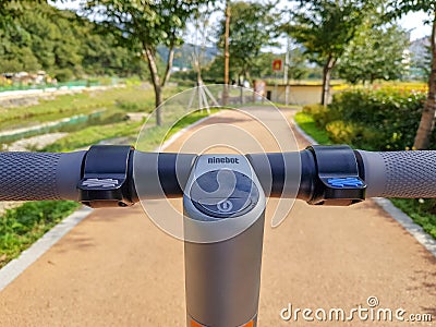 Ninebot by Segway ES2 Kickscooter`s handle with its LCD control panel Editorial Stock Photo