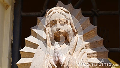 Nineteen century virgin mary face detail sculpture Stock Photo