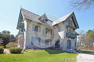 Nineteenth century cottage Norman Rockwell in Spring Editorial Stock Photo