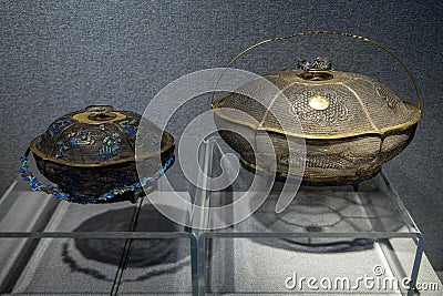 During the nineteenth Century silver manufacturing crafts, silver paste Shaolan blue silk tired. Editorial Stock Photo