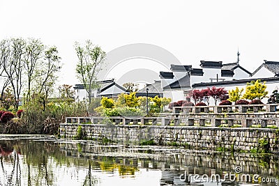 Ninety-nine and a half antique folk houses and pond Stock Photo