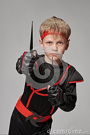 Ninja holding kunai Stock Photo