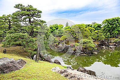 Ninomaru Garden with pines, pond and rocks, Kyoto, Japan. Ninomaru-Garden is the garden of Nijo Castle, Stock Photo