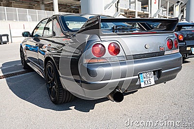 ninth-generation Nissan Skyline GT R33 at a Japanese sports car meet. Editorial Stock Photo