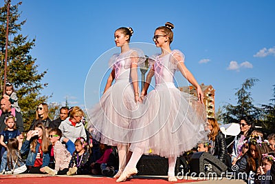 Harmonic Elegance: Teenage Ballerinas Illuminate the Open-Air Stage Editorial Stock Photo