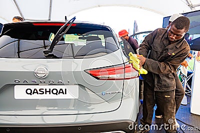 Nissan Qashqai E-Power electric vehicle being polished on display Editorial Stock Photo