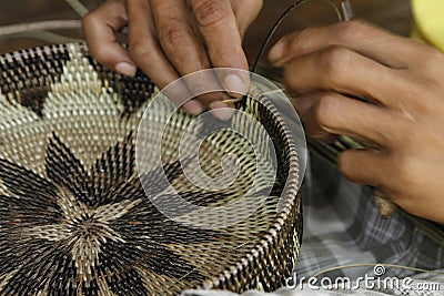 Nito basket weaving from the Iraya-Mangyan community of Mindoro, Philippines Stock Photo