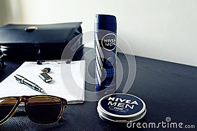 Nivea Men Products display with office related object Editorial Stock Photo