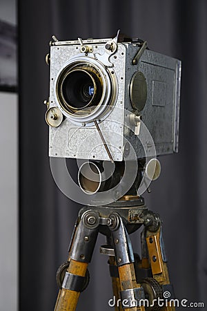 NIZHNY NOVGOROD - APRIL 18, 2023: Retro movie camera on a tripod made in France in the 40s of the last century Editorial Stock Photo
