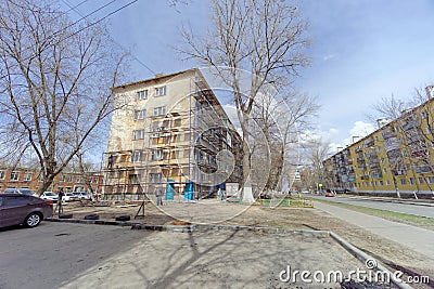 Nizhny Novgorod, Russia. - April 28.2018. Hasty repairs and painting of the facades of buildings near the football Editorial Stock Photo