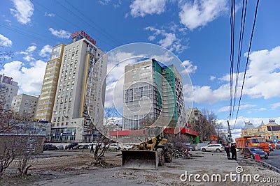 Nizhny Novgorod, Russia. - April 27.2018. Hasty repairs and painting of the facades of buildings near the football stadium on Sovn Editorial Stock Photo