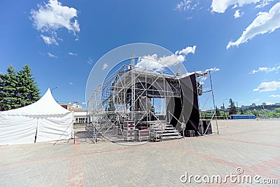 Nizhny Novgorod, Russia. - June 21.2018. The assembly of the temporary stage for the performance of musicians and singers on Lenin Editorial Stock Photo