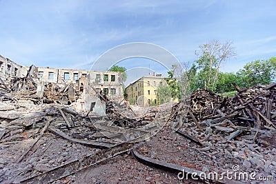 Nizhny Novgorod, Russia. - May 24.2018. Demolition of an abandoned residential stone two-story house on Sovetskaya Street 2A. Editorial Stock Photo
