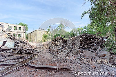 Nizhny Novgorod, Russia. - May 24.2018. Demolition of an abandoned residential stone two-story house on Sovetskaya Street 2A. Editorial Stock Photo