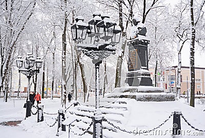 Nikolai Gogol First Monument in Nizhyn, Ukraine, coverd snow. Editorial Stock Photo